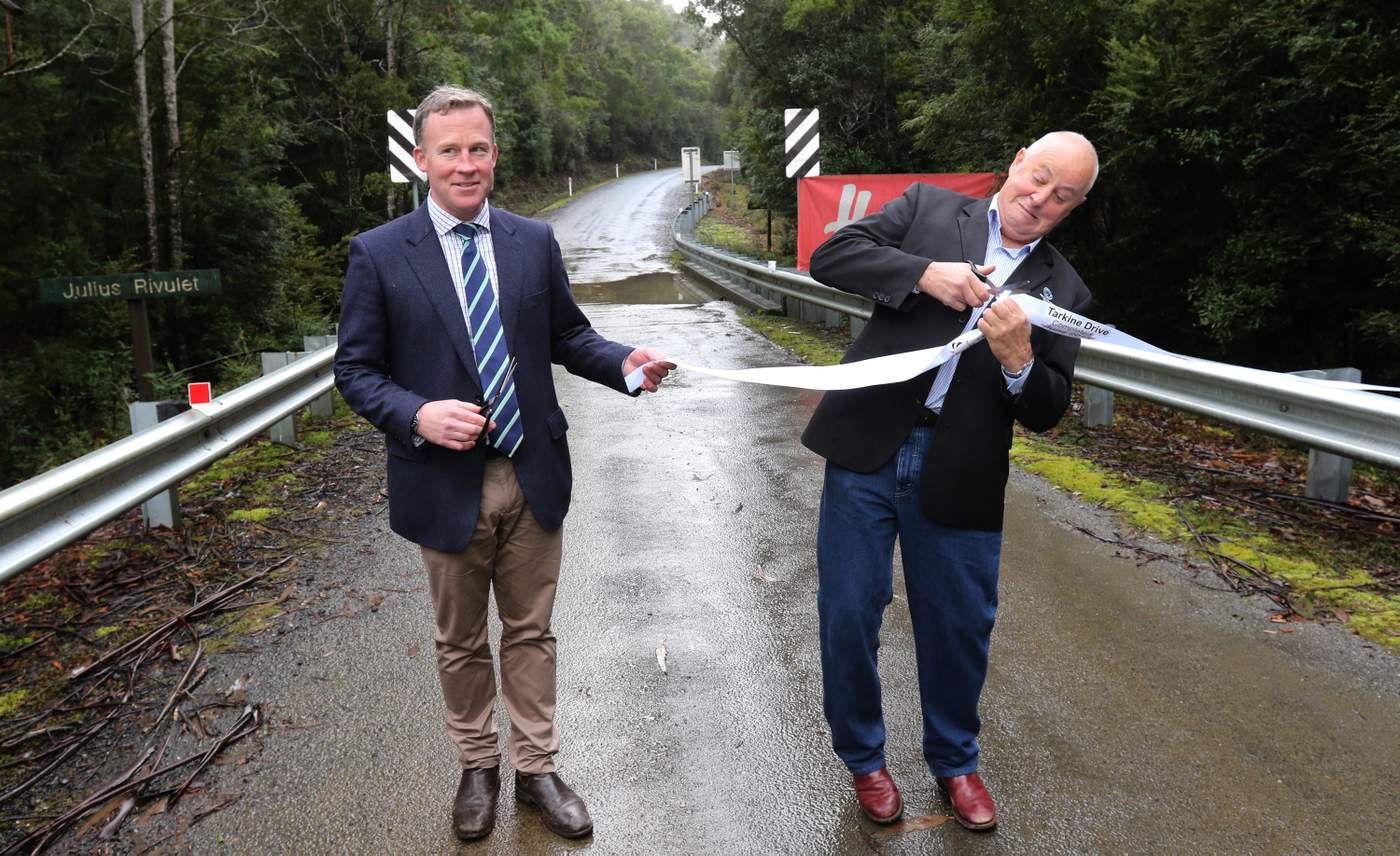The Tarkine Drive was a $23 million project aimed at attracting tourists to the region. Tasmanian Premier Will Hodgman and Circular Head mayor Daryl Quilliam cut the ribbon to mark its opening in 2015.