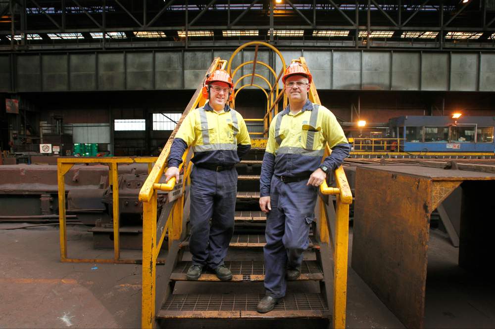 Plate rolling manager Steven Guy and plate mill asset manager Garry Luyten at the BlueScope plate mill. 