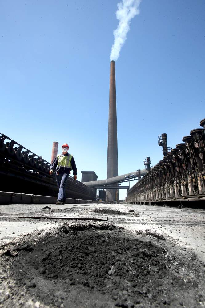 Ross Schuback on the top of the coke ovens&#39; Number 7 battery. The rails that the charging car moves along the top are visible.