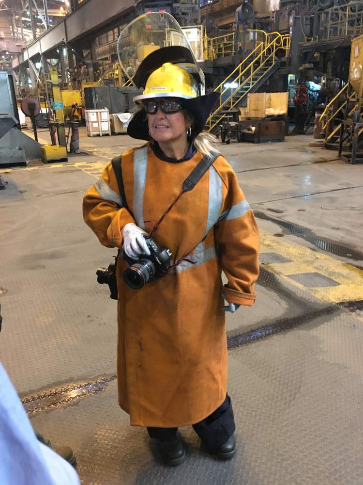 Mercury photographer Sylvia Liber suited up in protective gear to get close to red-hot steel.