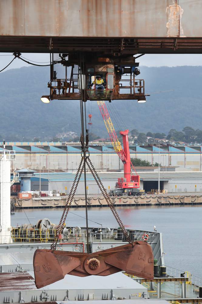 The claw being manouevred over a hatch in the capsize vessel Manila to remove iron ore.