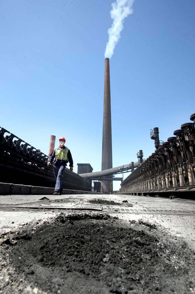 Ross Schuback on top of one of the coke oven batteries. That&#39;s not smoke billowing from it but steam from the water used to cool the red-hot coke.