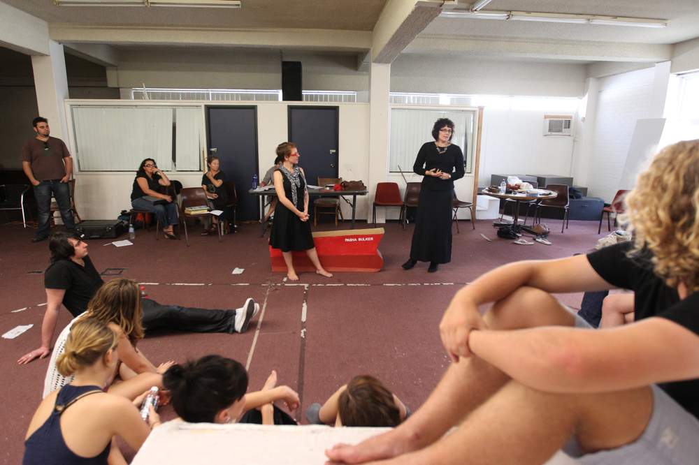 CAPTURING A CITY: Alana Valentine (standing right) with a Tantrum Theatre cast during rehearsals of her Newcastle-set play, Grounded, in 2012. Picture: Ryan Osland