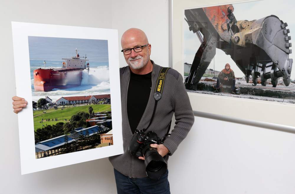 Murray McKean with his famed (and very real) photograph.  Murray McKean with his famed (and very real) photograph. 