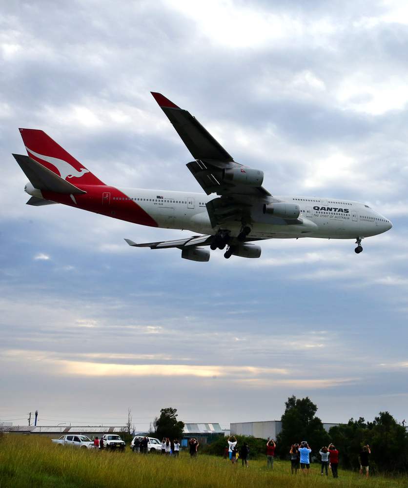 The Qantas 747 Jumbo the City of Canberra on final approach over Yallah Hill north of the Illawarra Regional airport at Albion Park Rail on March 8, 2015. Picture: KIRK GILMOUR